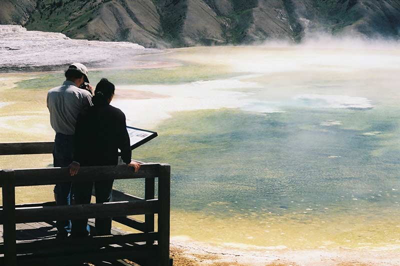 A couple enjoying Yellowstone Prismatic Spring