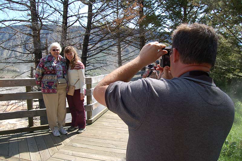 People doing photography in Yellowstone