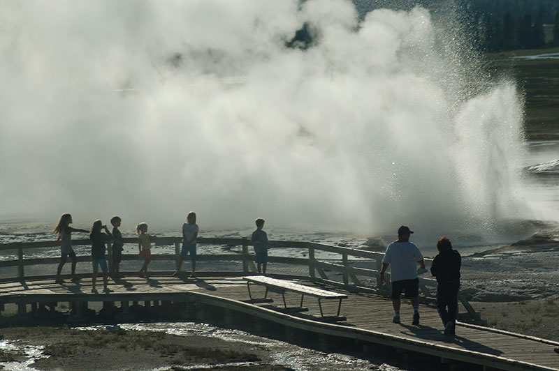 People watching Geysers at Yellowstone